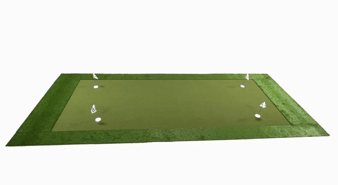 Green golf practice mat with white tees on a white background