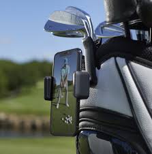 Garmin Approach R10 Golf club with smartphone holder attached on a blurred golf course background